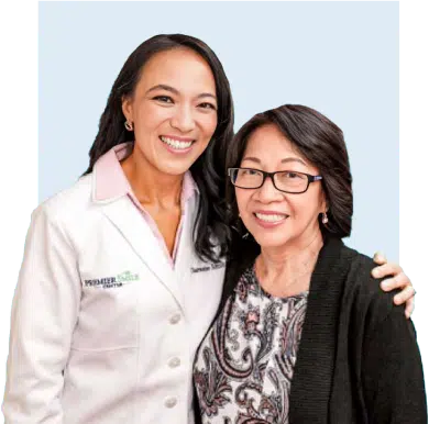 Dental care with Dr. Charmaine Johnson and a patient at Premier Smile Center